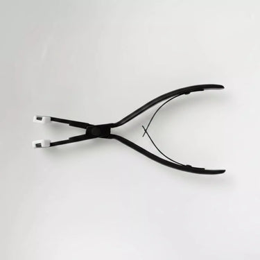 plier black stainless steel flat surface